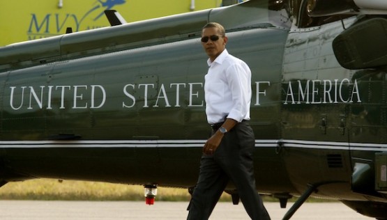 U.S.  President Barack Obama walks from Marine One upon his arrival in Martha’s Vineyard in Massachusetts